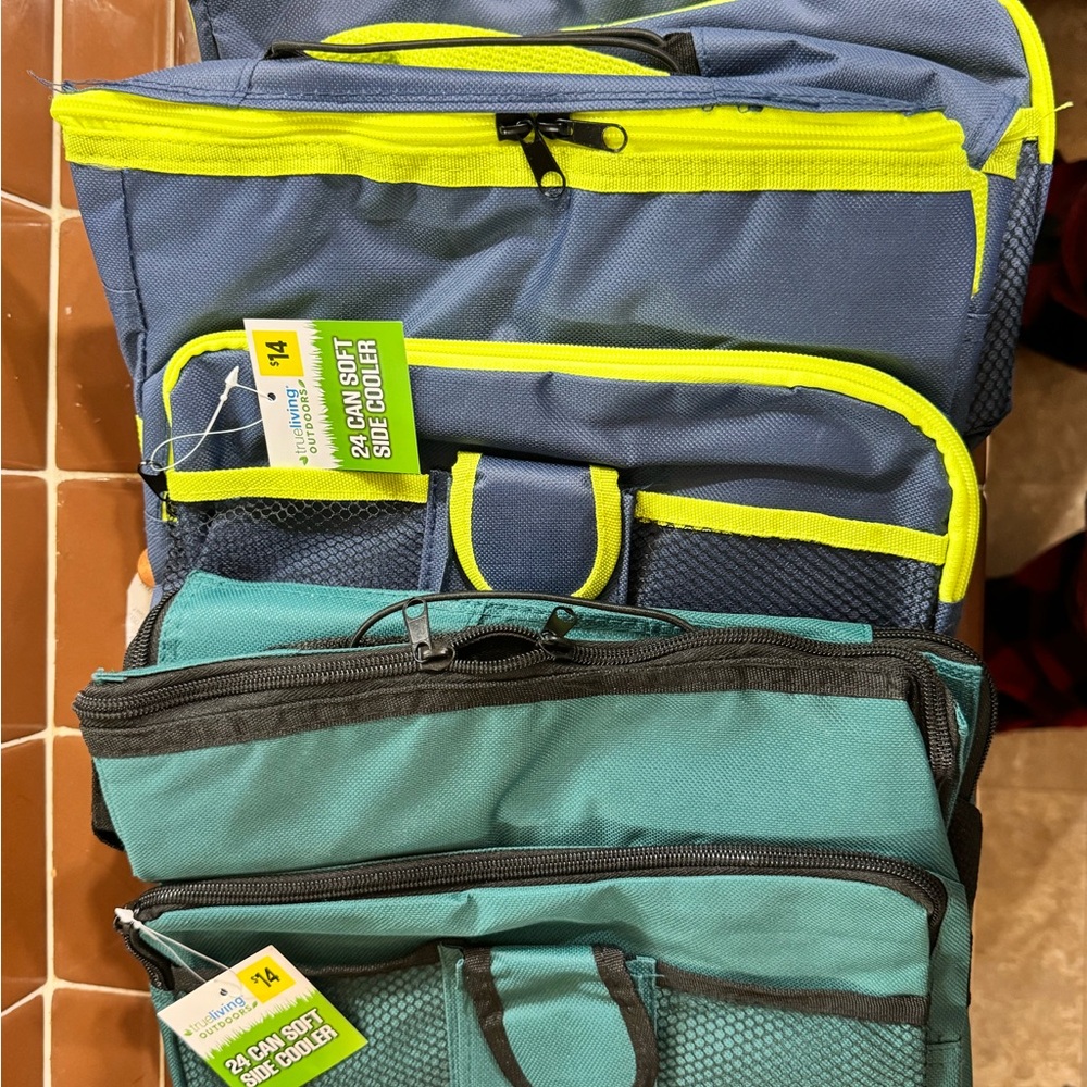 Blue and Green Travel Bags with Yellow Accents